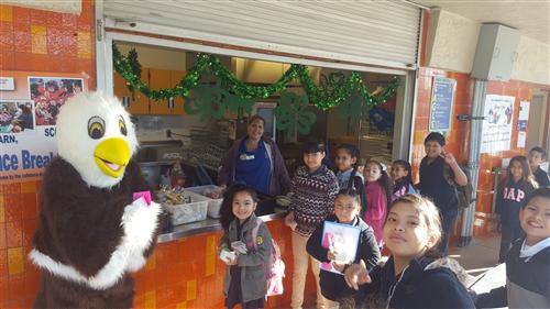 Ernie in the lunch line with students 